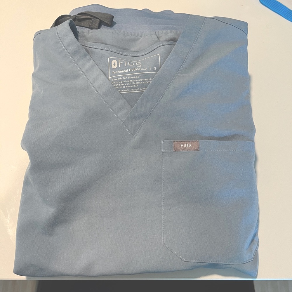 Dusty Blue FIGS Caterina scrub top and Zamora jogger scrub bottoms
